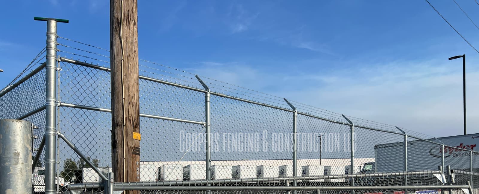 Commercial chain-link fencing and industrial property construction project